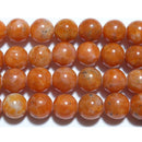 オレンジカルサイト丸玉8mmB （天然石ビーズ）
