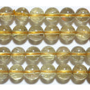 イエロースキャポライト丸玉7-8mmA （天然石ビーズ）