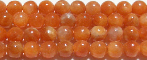 オレンジカルサイト丸玉6mmB （天然石ビーズ）