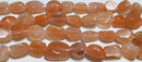 オレンジムーンストーンタンブル7*5mmB （天然石ビーズ）